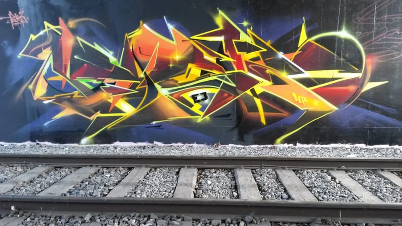 Fresque murale « Train line Writing · 2015 » par Piscologik